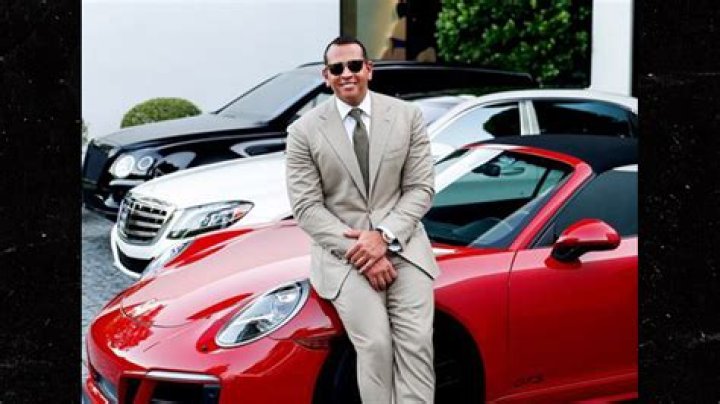 A-Rod Called A ‘Savage’ By Fans As He Poses With Red Porsche He Gifted J.Lo In 2019