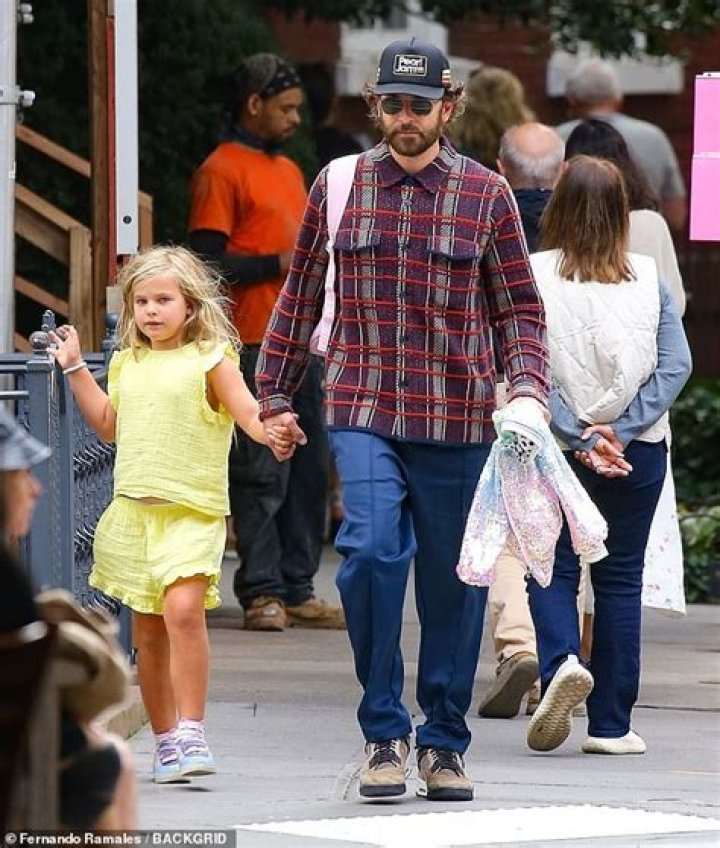 Bradley Cooper Plays Doting Dad To Daughter Lea, 2, Holding Her Hand While Shopping In Rainy LA