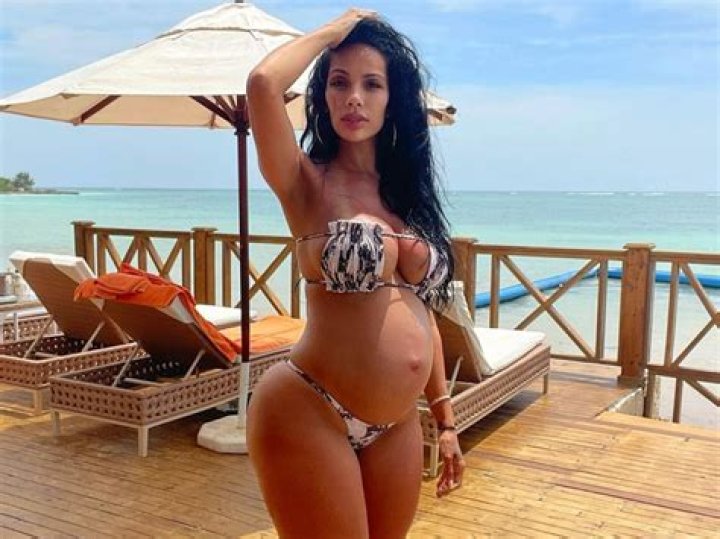 Erica Mena Reveals Baby Bump & Wears Nothing On Top With Safaree: Pic – Hollywood Life