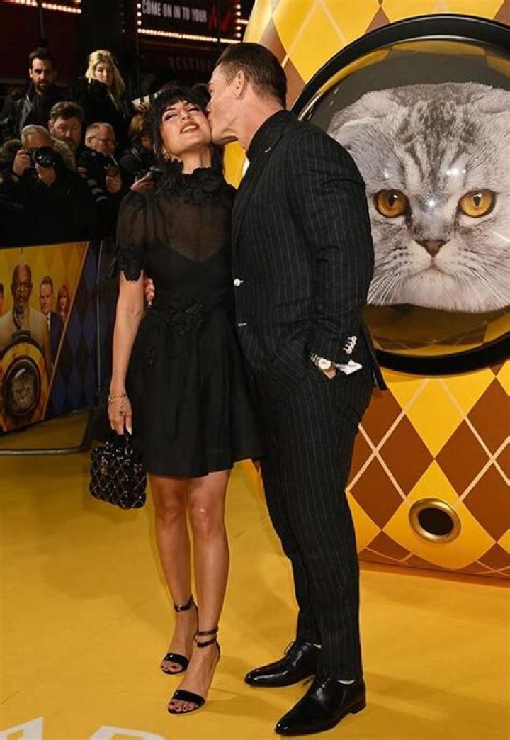 John Cena Sweetly Kisses Wife Shay Shariatzadeh at ‘Argylle’ Premiere: PDA Photos