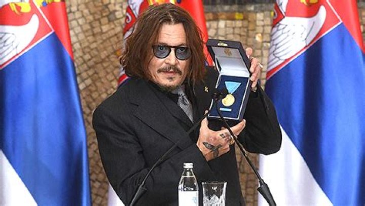 Johnny Depp Makes Rare Appearance After Losing Amber Heard Lawsuit To Receive Serbian Medal