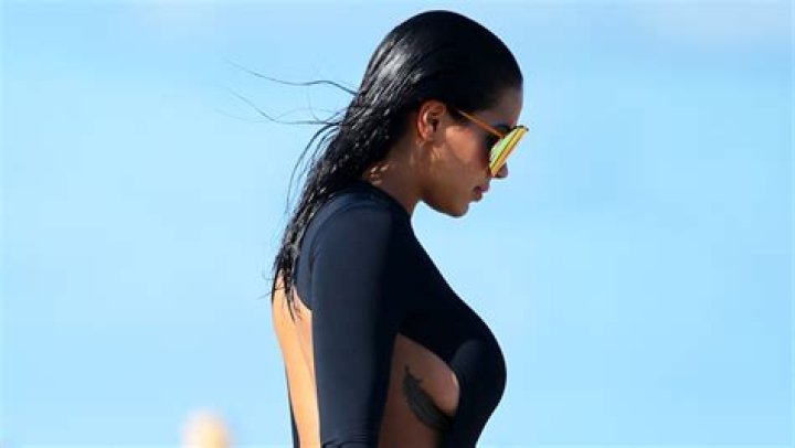 Kanye West’s Alleged New Flame Chaney Jones Channels Kim K. Again In Thong Bikini & Neon Tint Shades