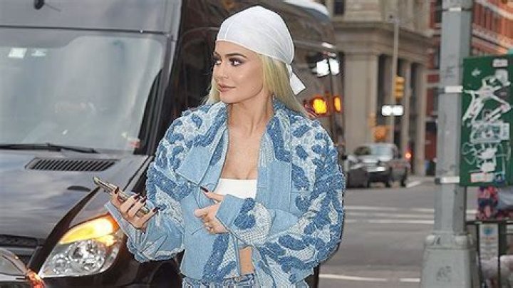 Kylie Jenner Rocks Daisy Duke Shorts & White Knee-High Boots While Lunching At The Beverly Hills Hotel