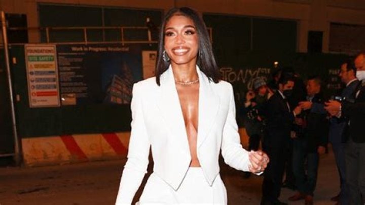 Lori Harvey Wears White Jacket With Nothing Underneath At Michael Kors Show — See Daring Look
